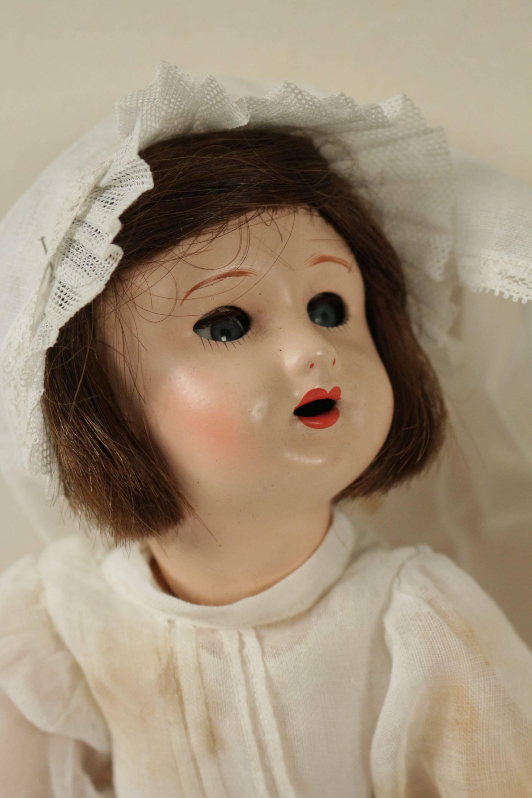 Doll from the beginning of the 20th century dressed for Sunday.
 