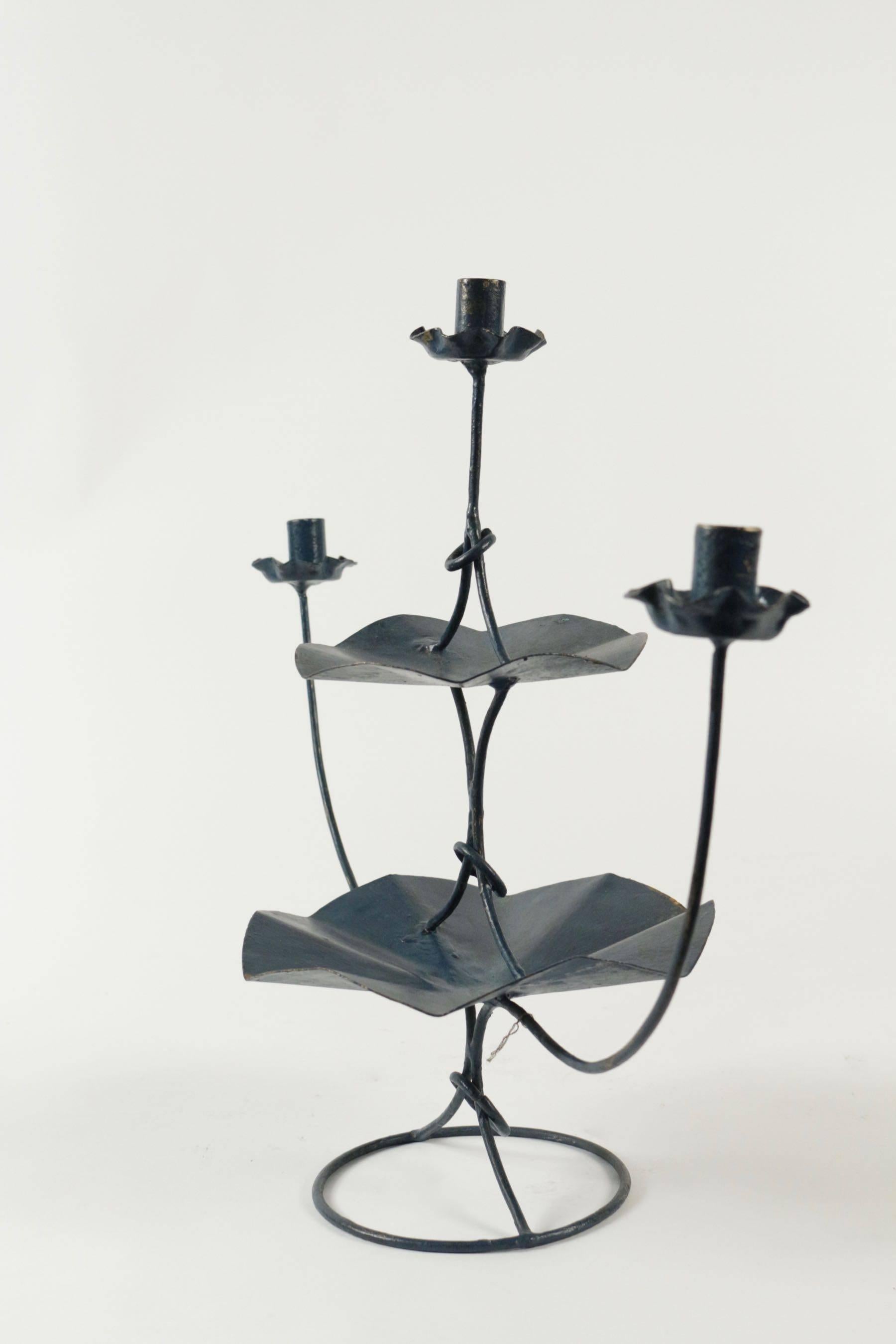 Candelabra with three arms from the 1960s in painted metal.
       