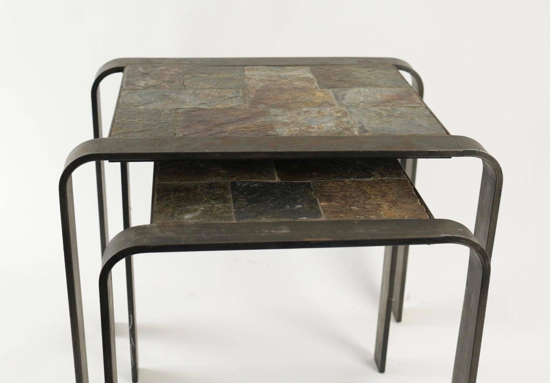 Nesting tables of the 1960s-1970s in wrought iron and slate.
 