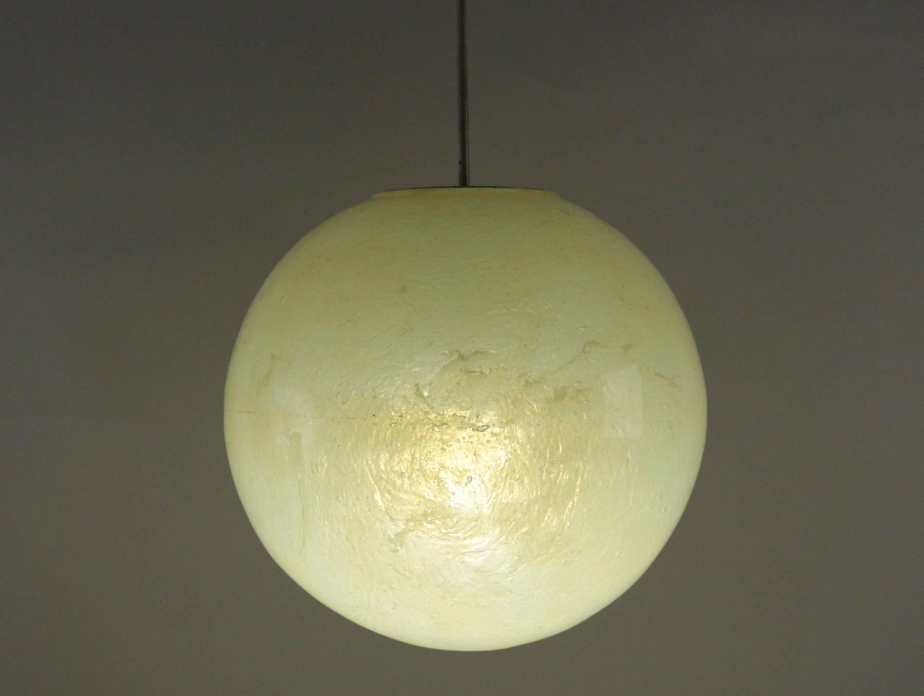 Ceiling light fixture from the 1960s in opalescent resin.
 