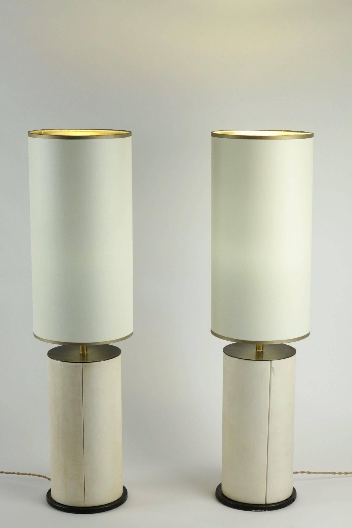 Pair of lamps in parchment and bronze, circa 1940.
 