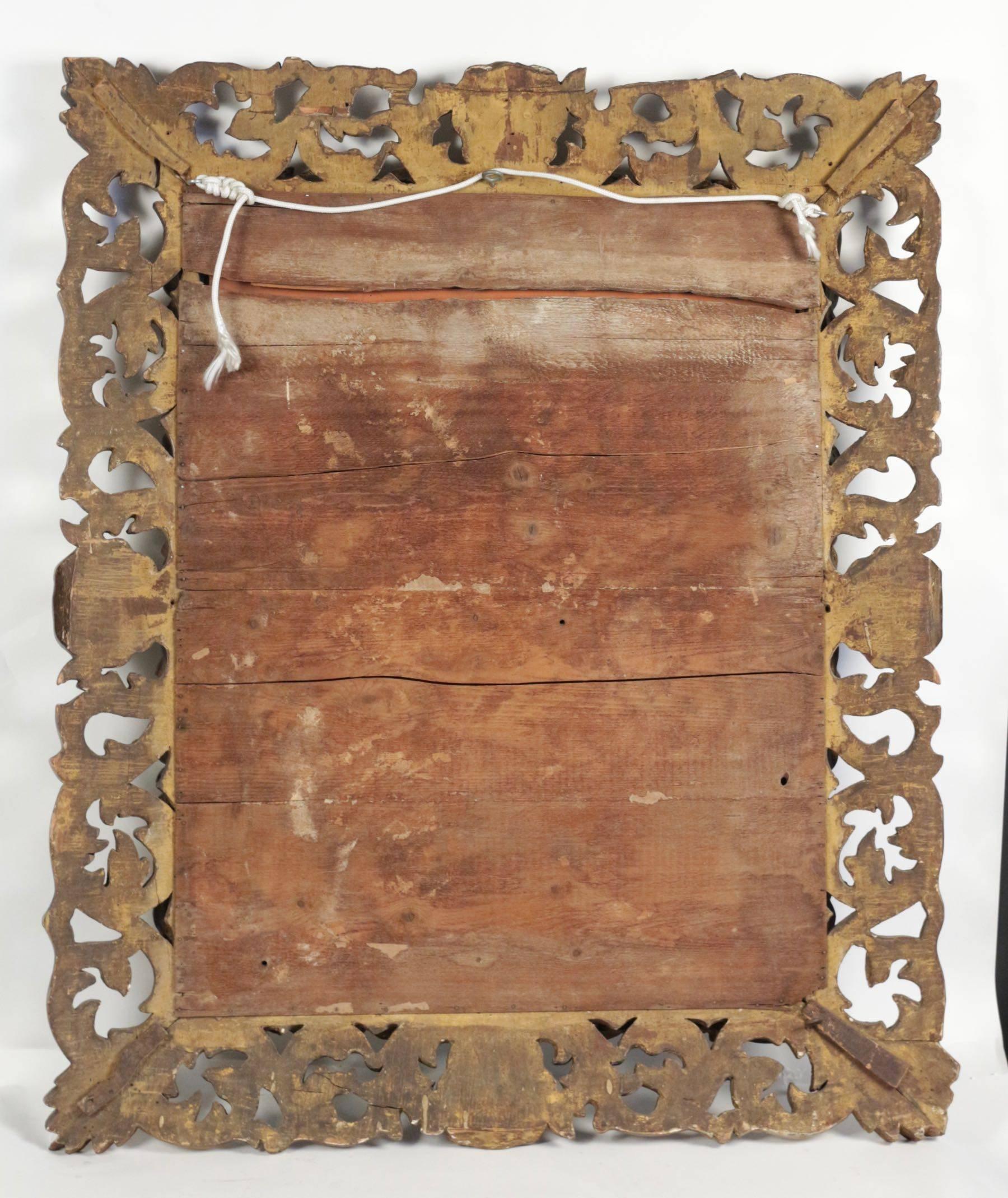 Late 19th Century Napoleon III Mirror in Hand Carved Gold Gilded Wood with Beveled Mirror