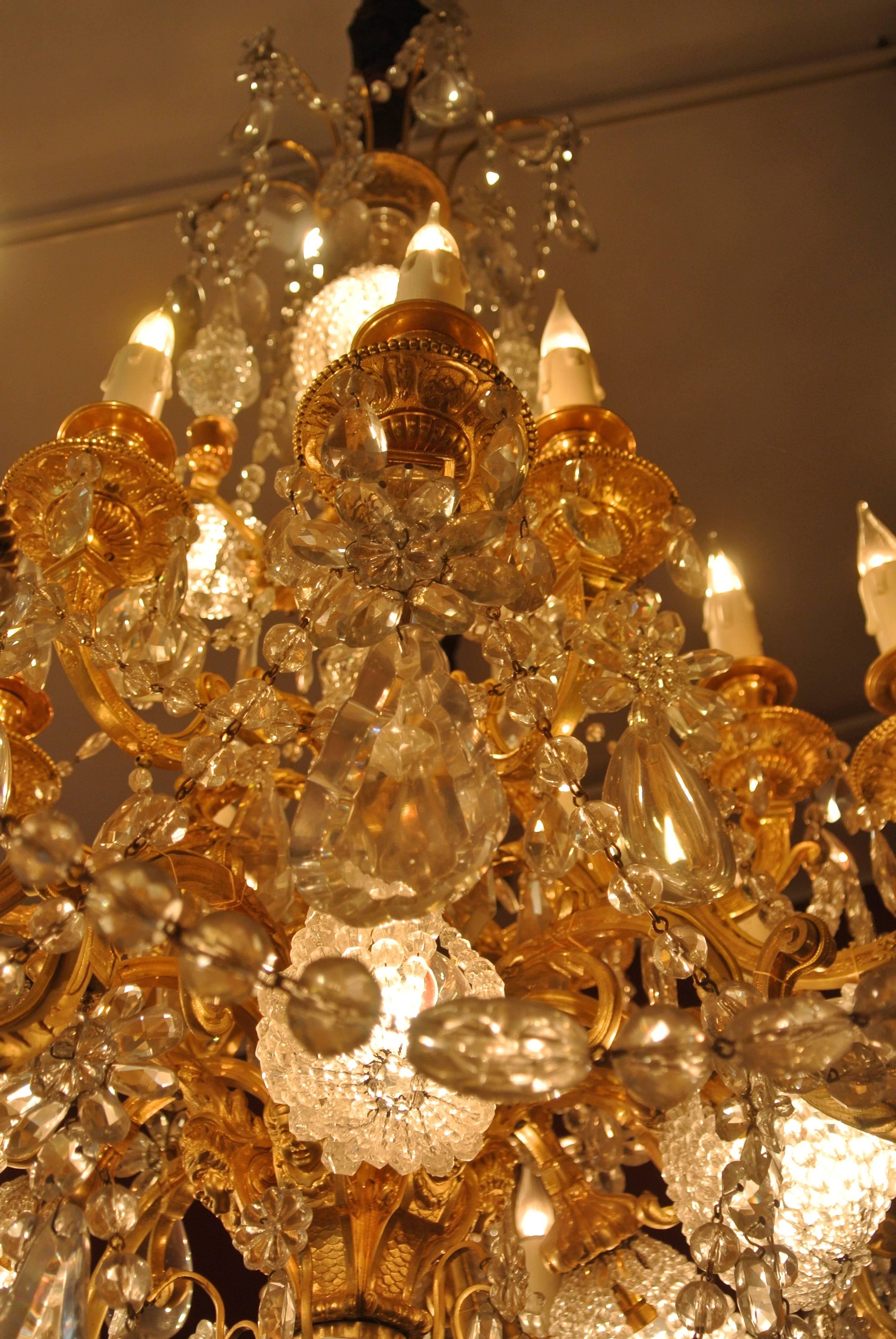 A Fine Important Baccarat Crystal Chandelier in Bronze Dore and Carved Crystal 1