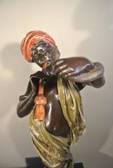 Bemalte Bronze von Goldsheider mit dem Titel „Serpent Charmer“