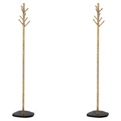 Pair of Patinated Brass Coat Racks with Black Marble Base.