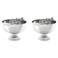 Paire de seaux à champagne en métal argenté au design chic.