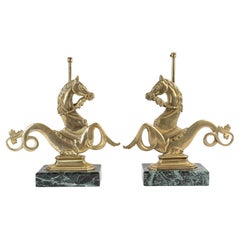 Coppia di basi per lampade in marmo e bronzo, XX secolo.