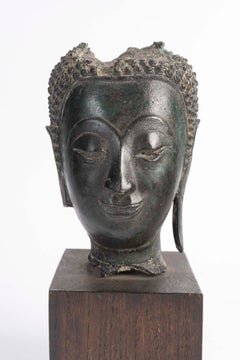 18th Century Patinated Bronze Sculpture of a Buddha’s Head.