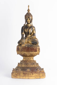 19th Century Lacquered and Gilded Wooden Sculpture of a Seated Buddha.