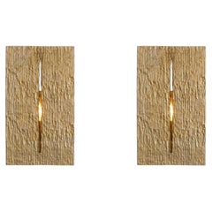 Ein Paar moderne Wandleuchten aus poliertem Messing