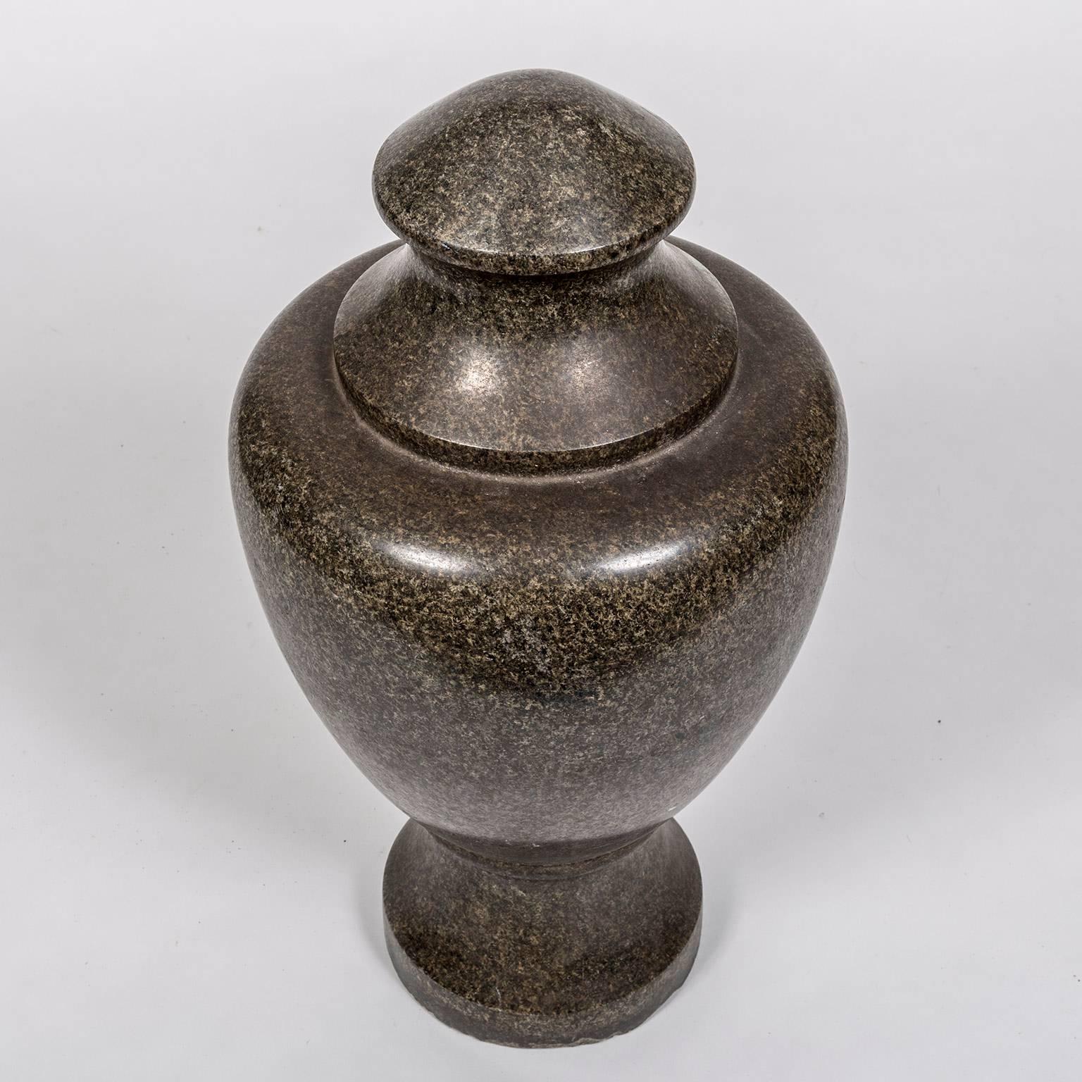 19th century granite stone Grand Tour style decorative vase. Granite is a very hard igneous rock that has a very pleasing granular decoration. These two qualities are responsible for its use in architectural and decorative elements from as far back