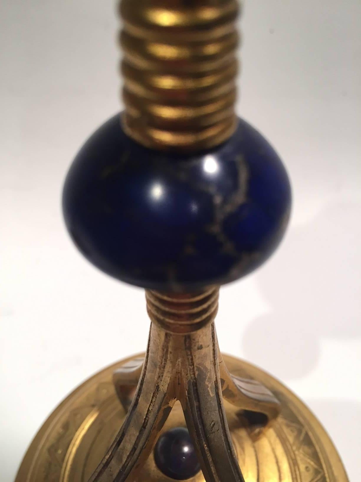 Beautiful 1890s pair of rare Art Nouveau French bronze gilded and lapis lazuli candlesticks.