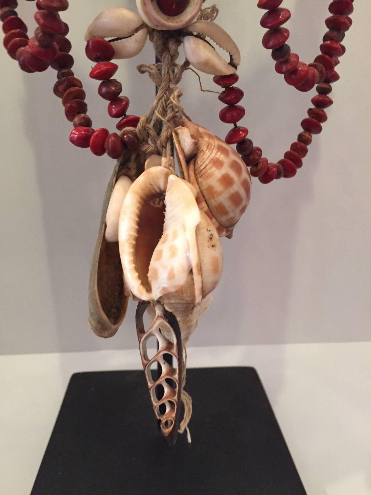 Headdress from Papua New Guinea Made from Cowrie Shells and Red Seeds, Mounted  In Good Condition In New York, NY