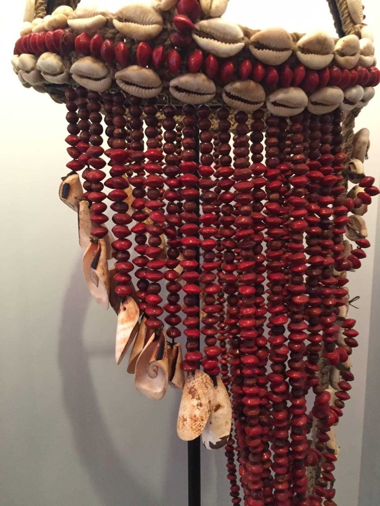 Contemporary Headdress from Papua New Guinea Made from Cowrie Shells and Red Seeds, Mounted 