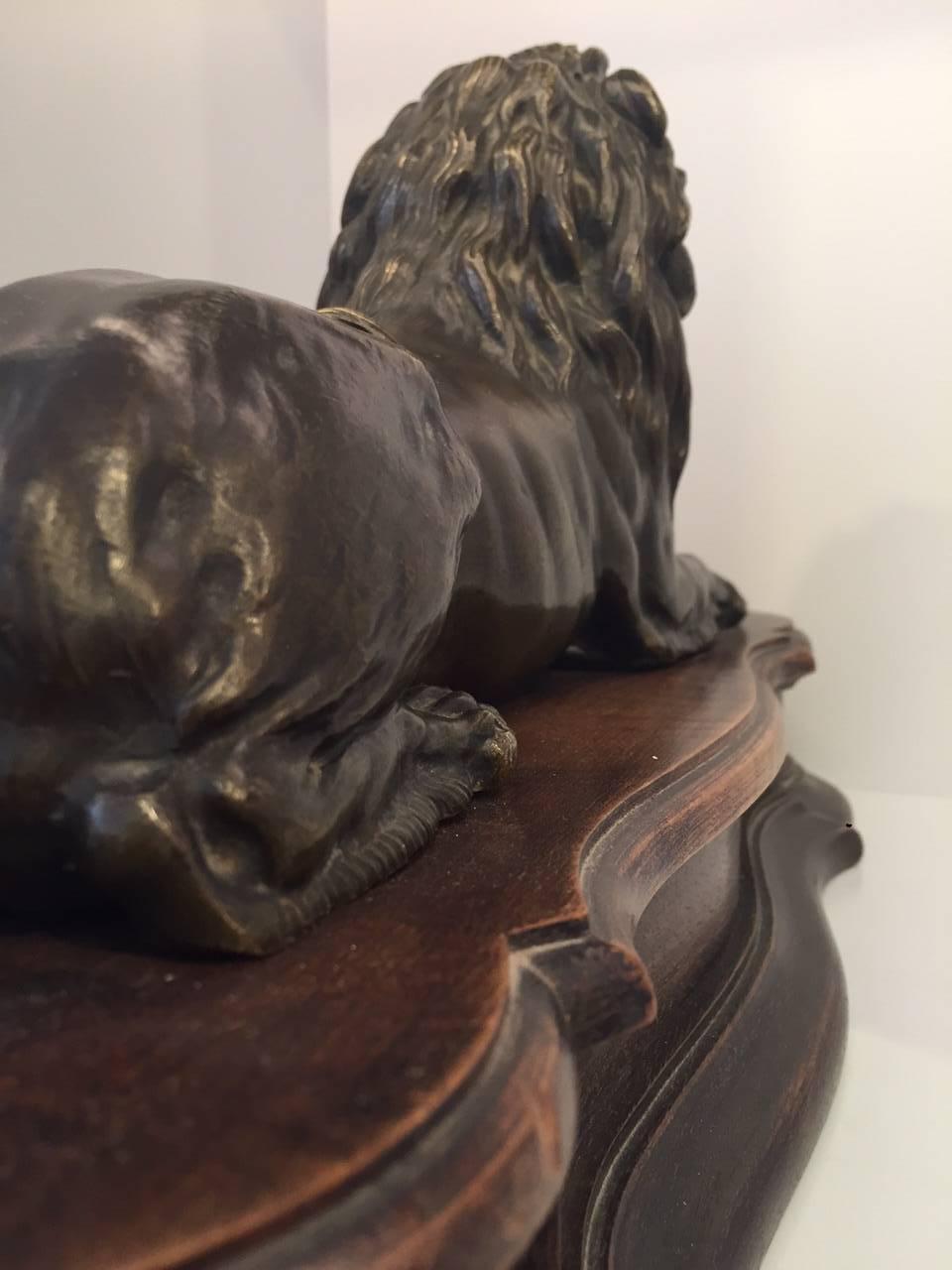 Large 19th Century French Grand Tour Bronze Recumbent Lion on Carved Wood Base 1