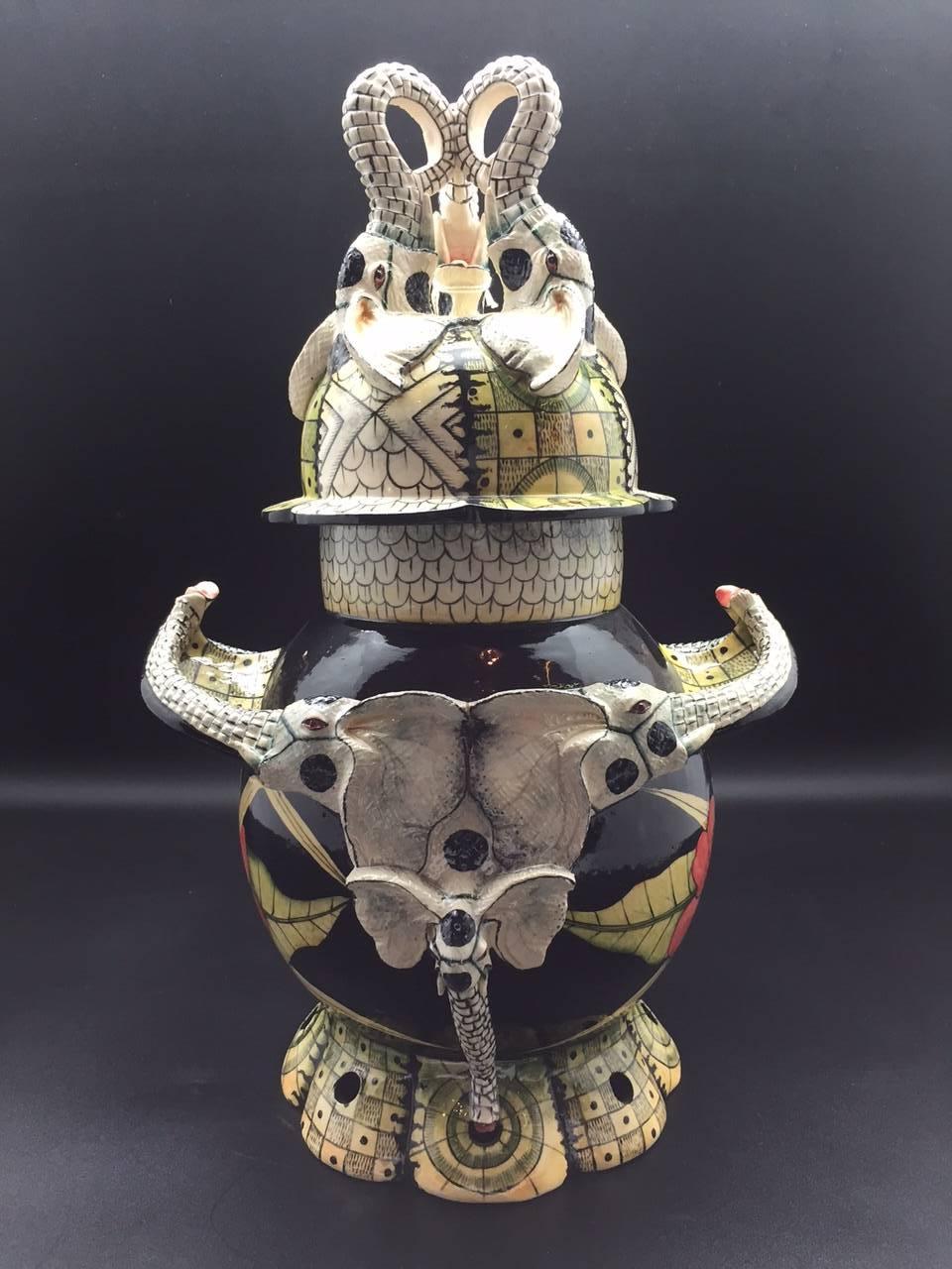 A pair of elephant tureen ceramic sculpture by Ardmore from South Africa. Sculpted by Sabelo Khoza and Qiniso Mungwe, painted by Wiseman Ndlovu. Measures: 9
