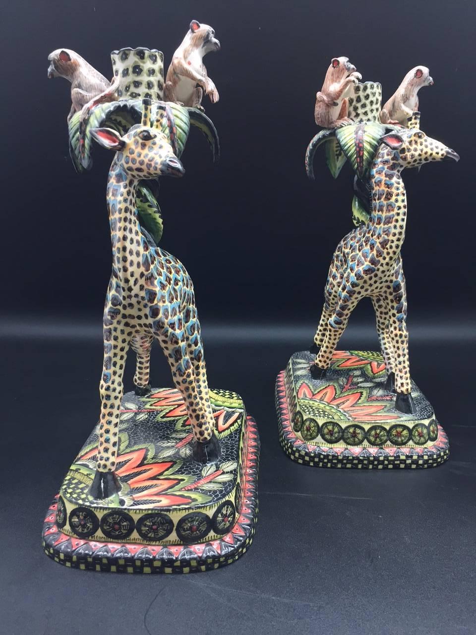 Giraffe and monkey candlestick holders, a pair, ceramic by Ardmore from South Africa. Sculpted by Sabelo Khoza, painted by Punch Shabalala. Measures: 7