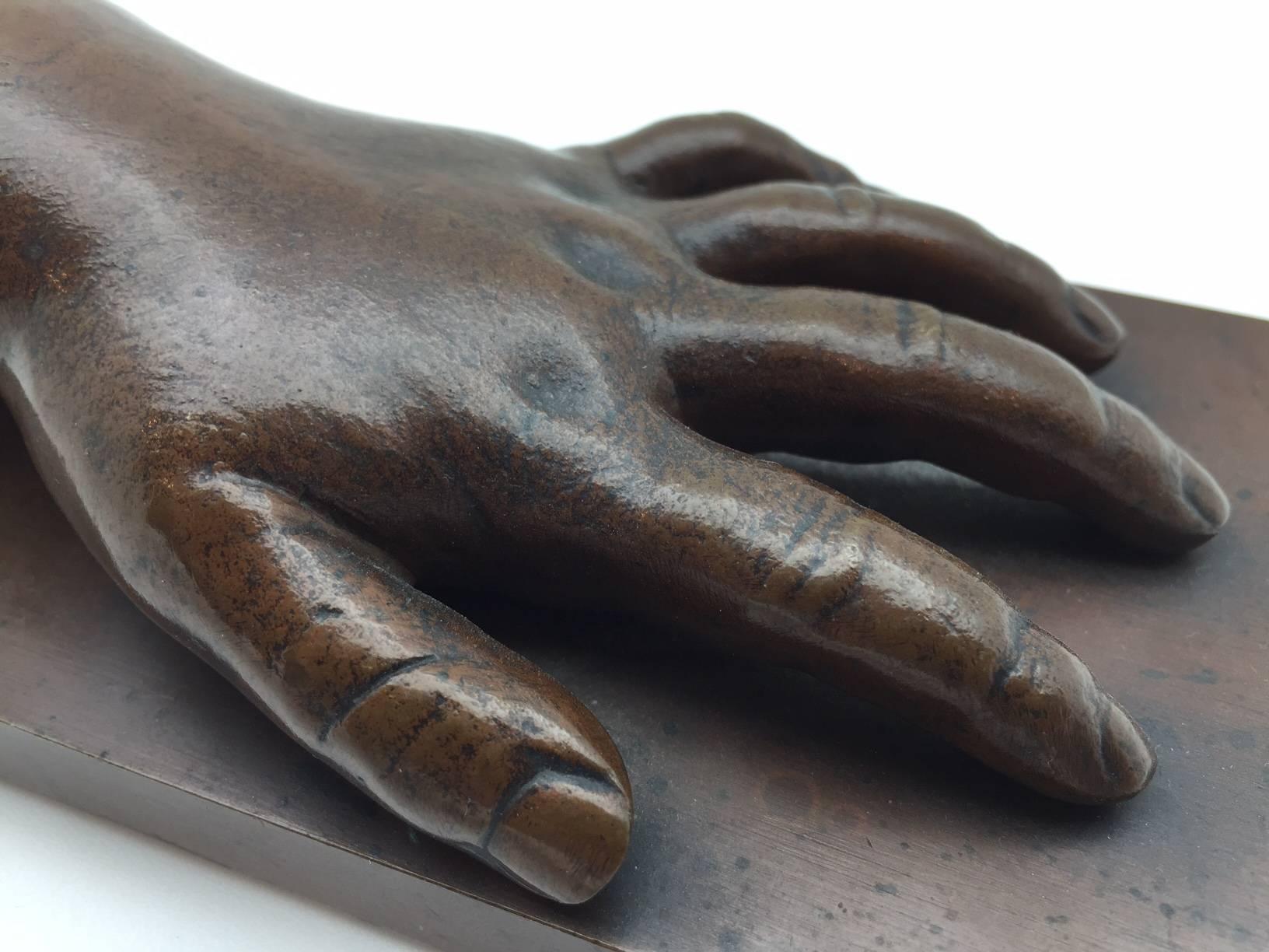 French 19th Century Patinated Bronze Baby Hand on a Bronze Base Insribed 