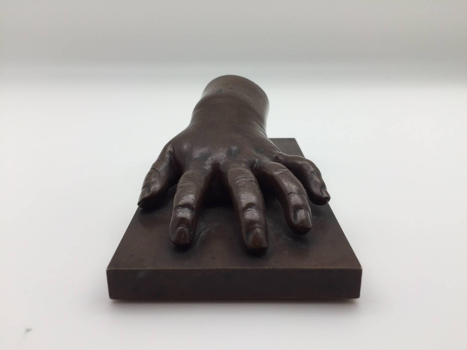 19th Century Patinated Bronze Baby Hand on a Bronze Base Insribed 