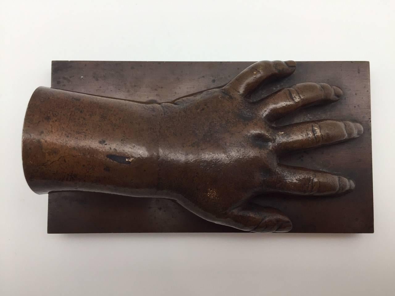 19th Century Patinated Bronze Baby Hand on a Bronze Base Insribed 