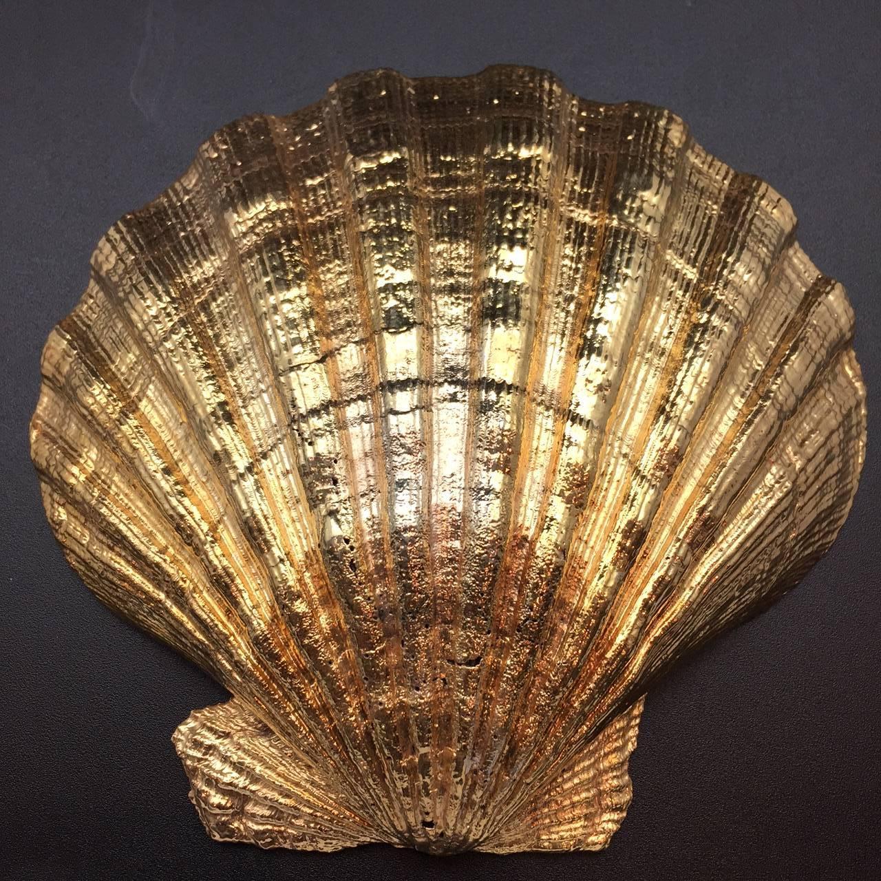 Gold vermeil pecten shell made in Rome, Italy, exclusively for Creel and Gow. It is the symbol of pilgrims on the way to Santiago de Compostella in Northern Spain and of their patron saint James. It is an ideal vide poche for your desk or a