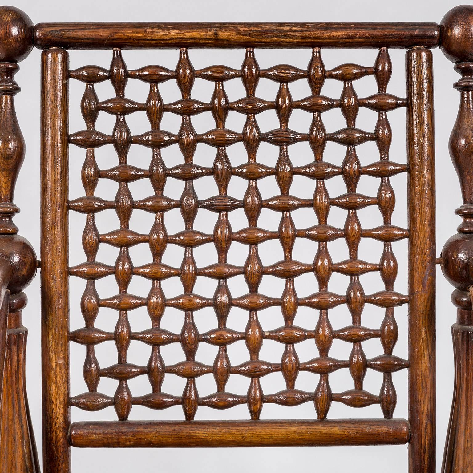 20th Century Arts and Crafts Period Oak Lattice Fretworked Armchair