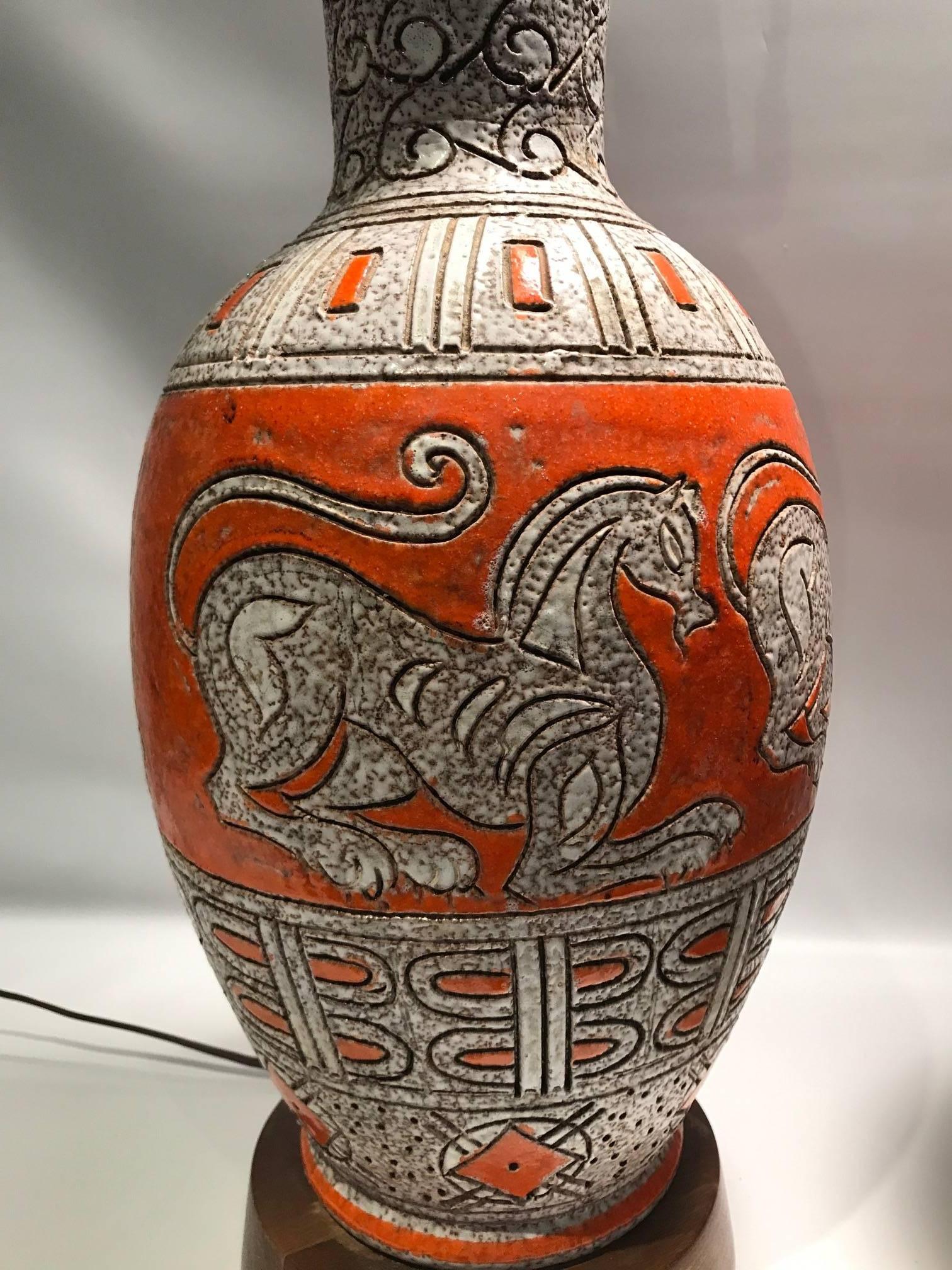 Mid-Century Modern Pair of Mid-Century Italian Orange Glazed Ceramic Lamps with Chimera Decoration