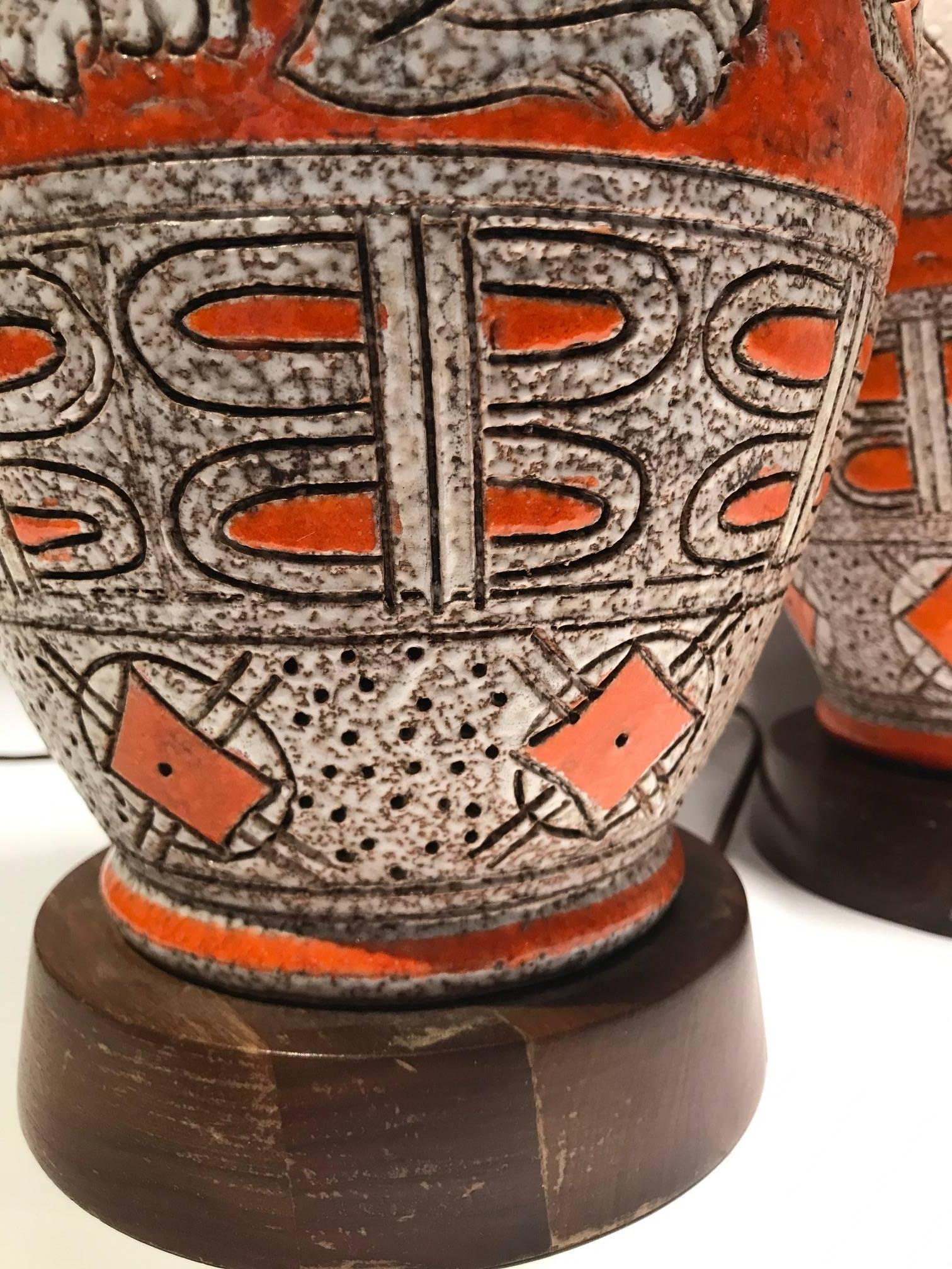 Pair of Mid-Century Italian Orange Glazed Ceramic Lamps with Chimera Decoration In Excellent Condition In New York, NY