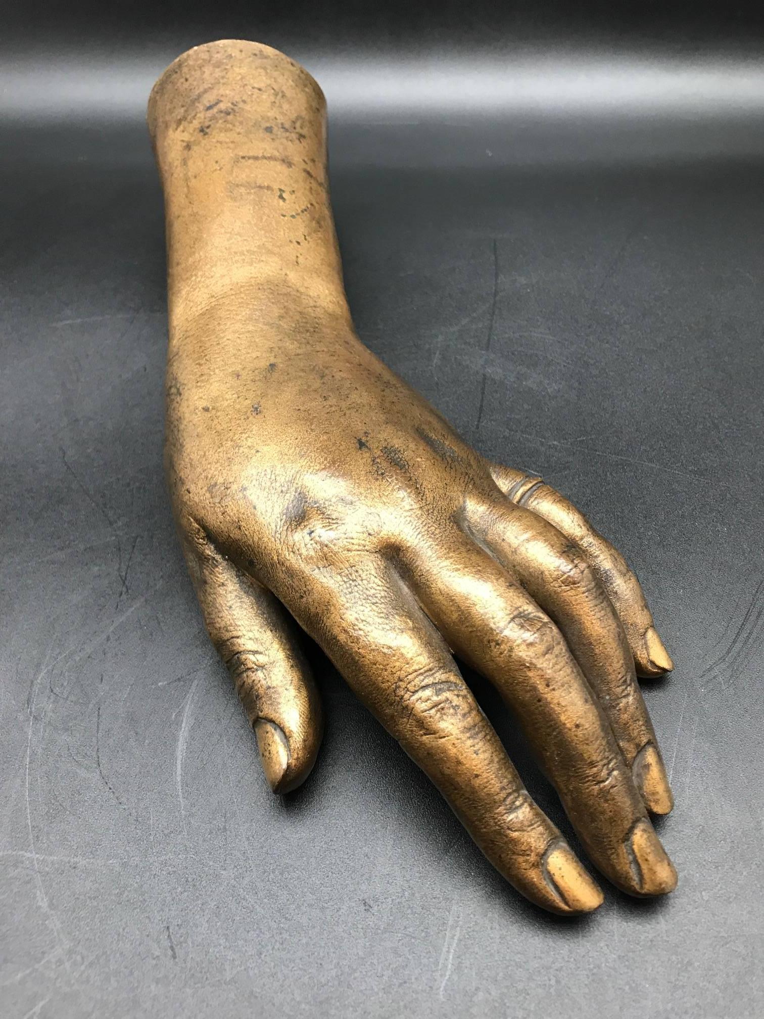 Detailed life-size French 19th century gilded bronze hand sculpture.