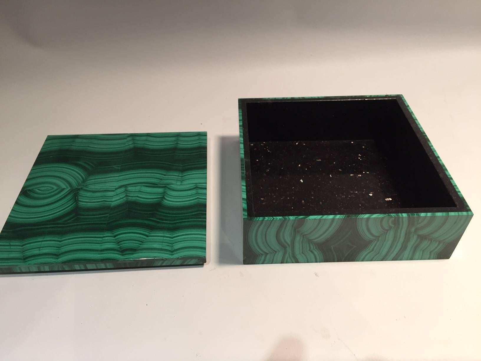 The malachite for this box was sourced from the Congo, where the finest quality of this mineral is currently found. The malachite for this box was sent to India where the stone was cut and the box was assembled. Malachite from the 18th and 19th