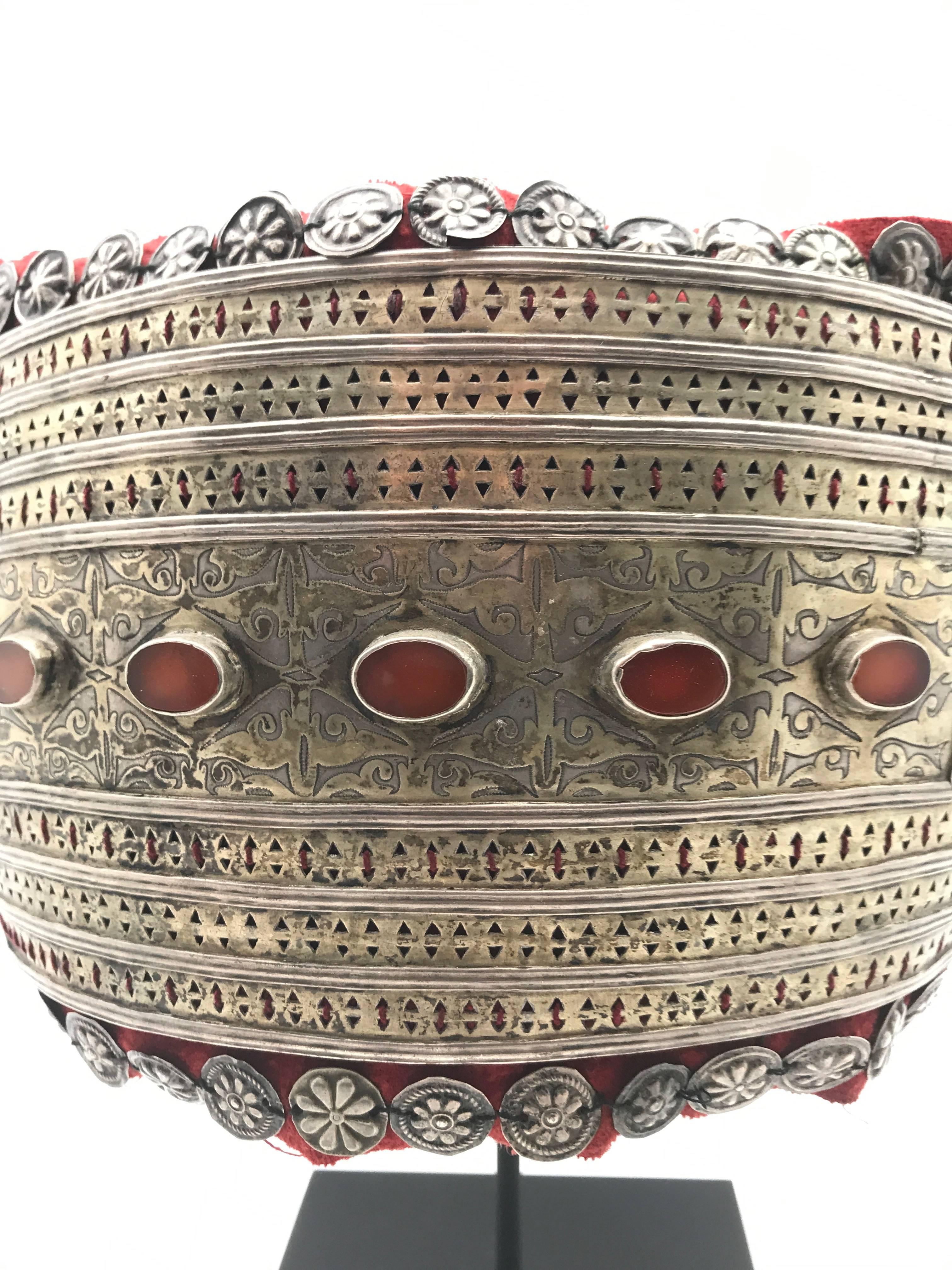 Beautifully mounted silver and carnelian headdress from Turkmenistan. This piece was worn as part of the traditional Turkmen woman's ceremonial outfit.