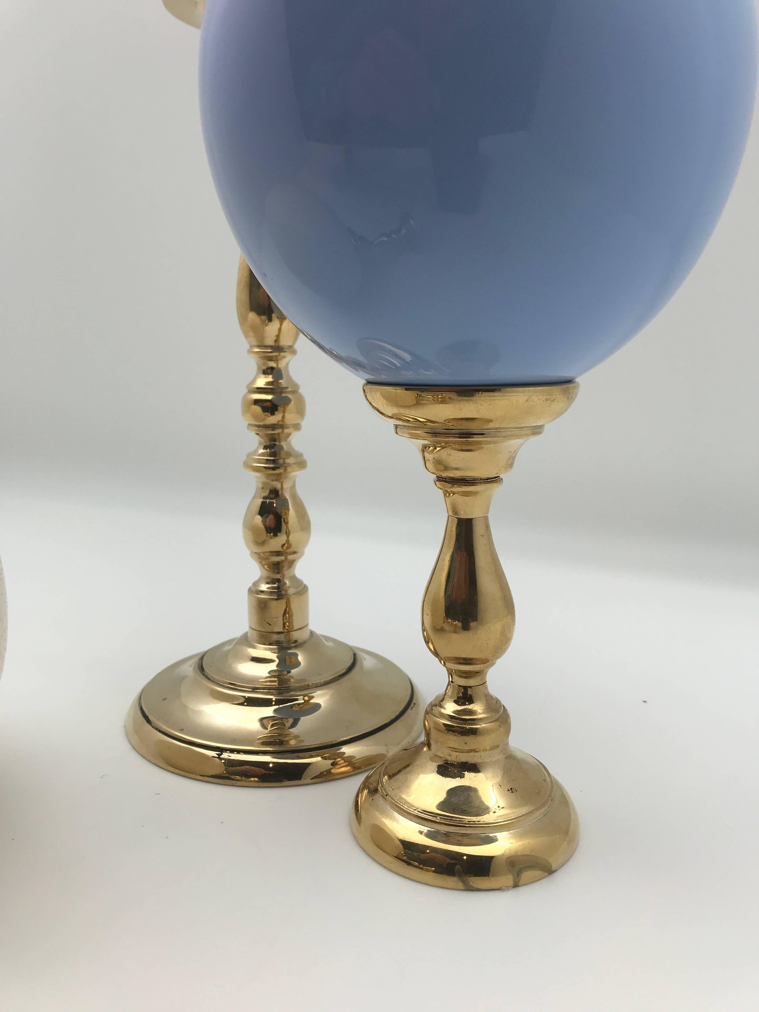 Grand Tour Lacquered and Natural Ostrich Eggs Mounted on Brass Bases