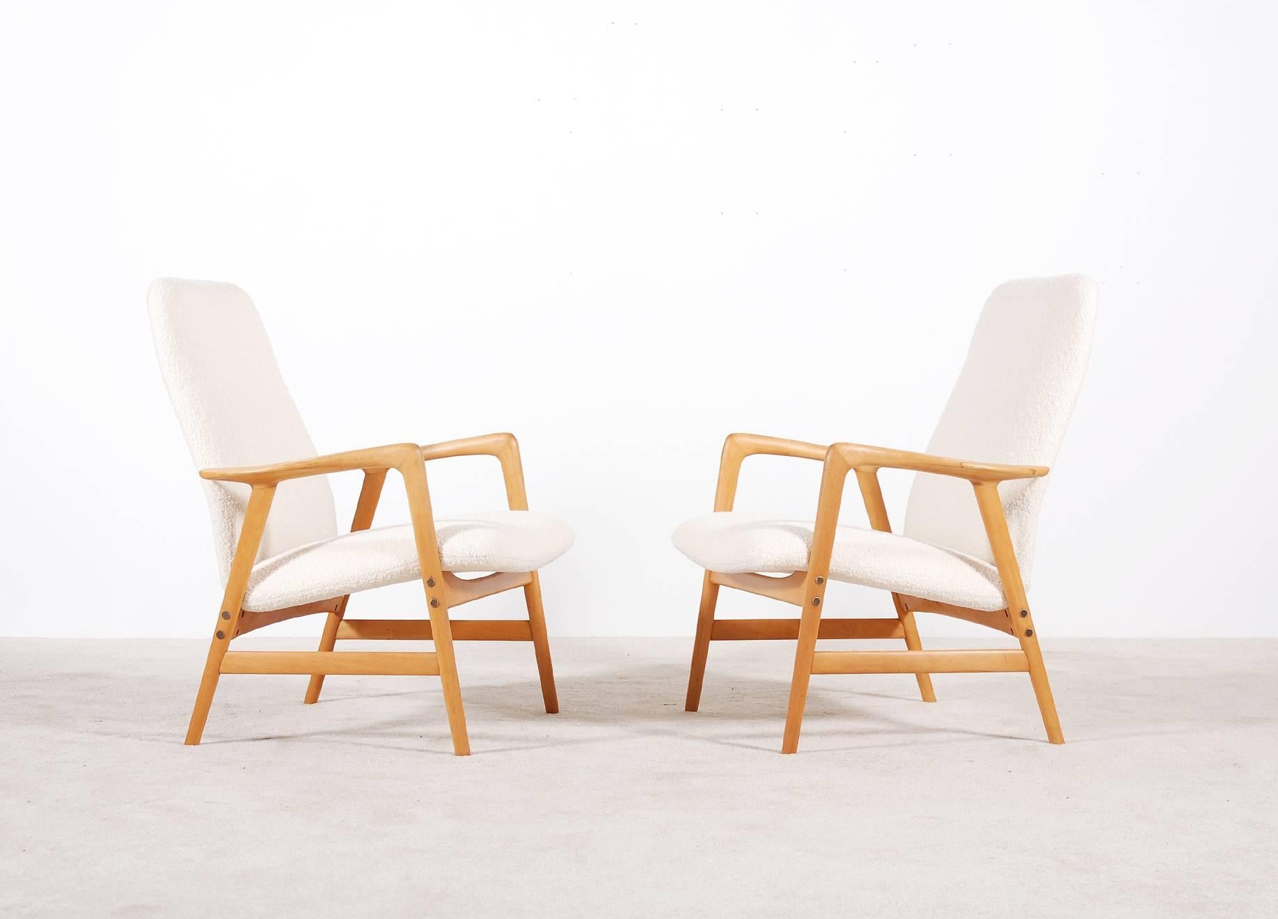 Pair of lounge chairs designed by Alf Svensson and manufactured by Fritz Hansen. Solid beech frame and newly upholstered with wool fabric.

Excellent condition.