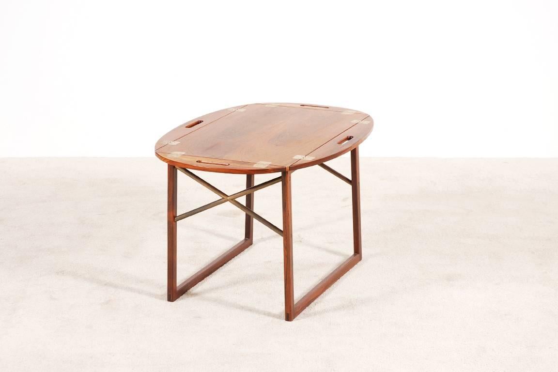 Rosewood side table with a removable top tray and pulled-town tray sides. It was designed by Svend Langkilde for Illums Bolighus, circa 1960. 

Excellent condition.
