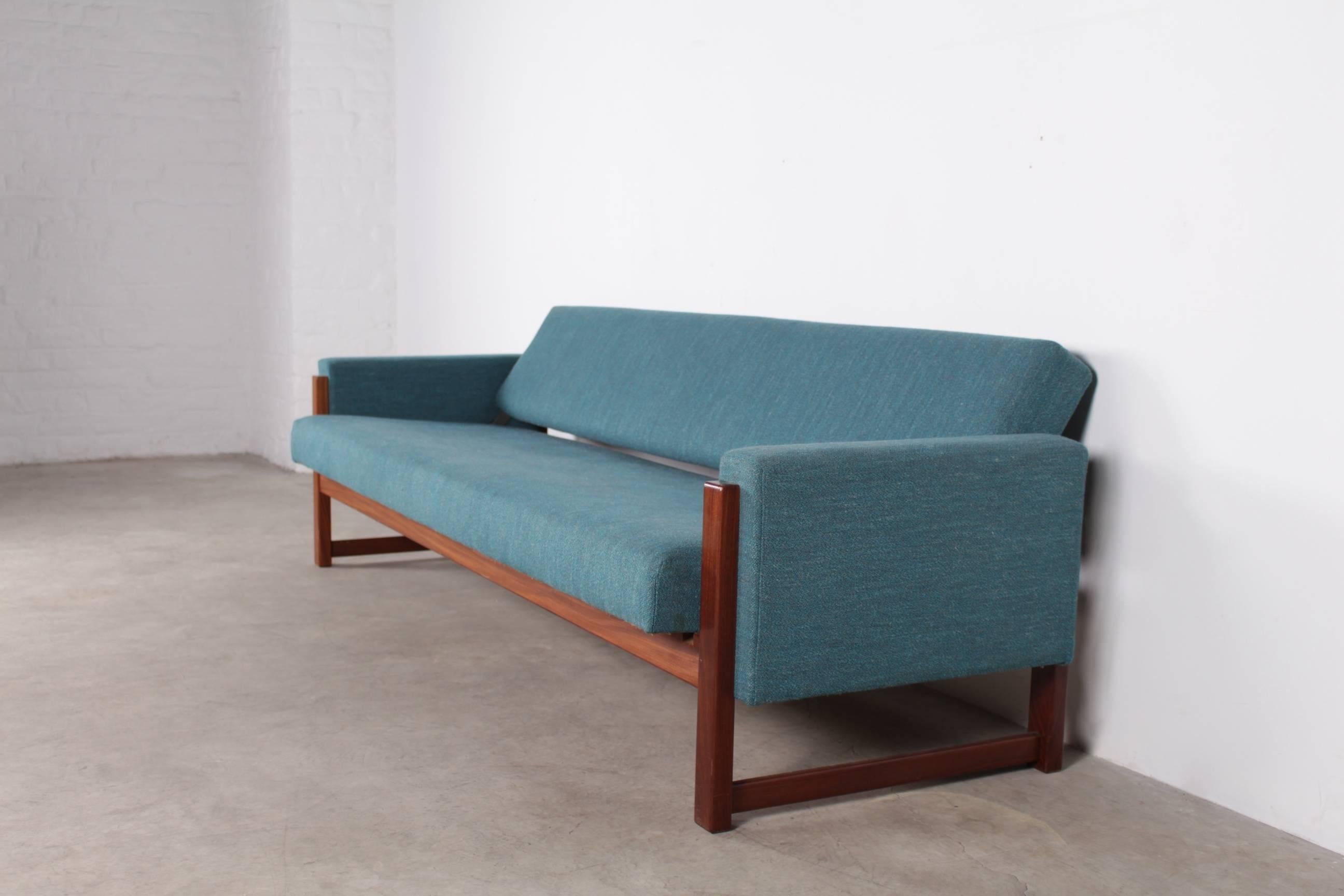 A quite rare sofa bed designed by Yngve Ekström in the 1960s, it is foldable by pulling on the seat and the back simultaneously and can be used as a daybed.
The frame is made of teak, with new upholstery.
Excellent condition.
As daybed, depth is
