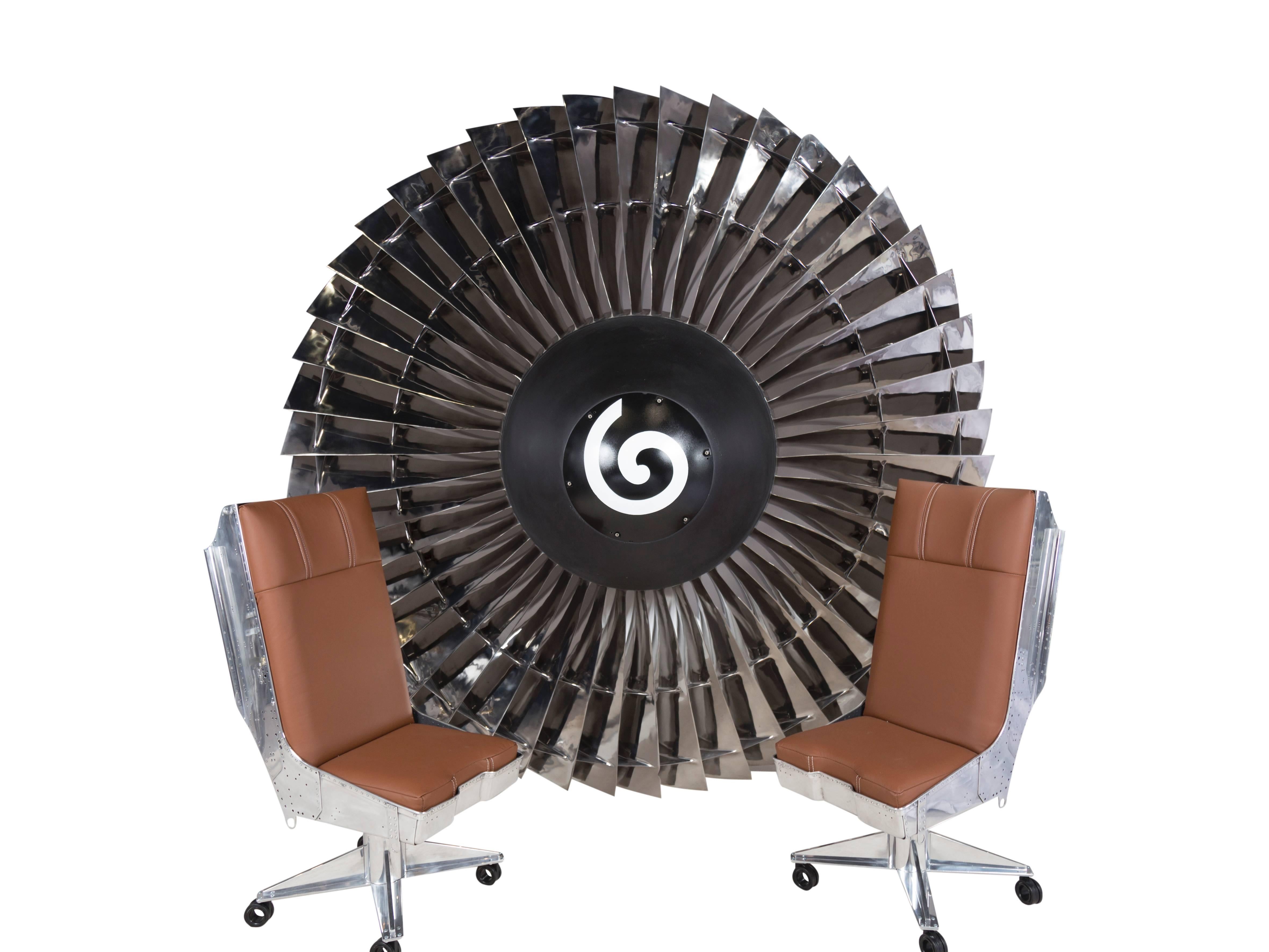 This impressive sculptural piece is an authentic, hand-polished fan blade from a Boeing 747 aircraft. The Pratt & Whitney JT9D engine was the first high-bypass-ratio jet engine to power a wide-body airliner. Its initial application was the Boeing