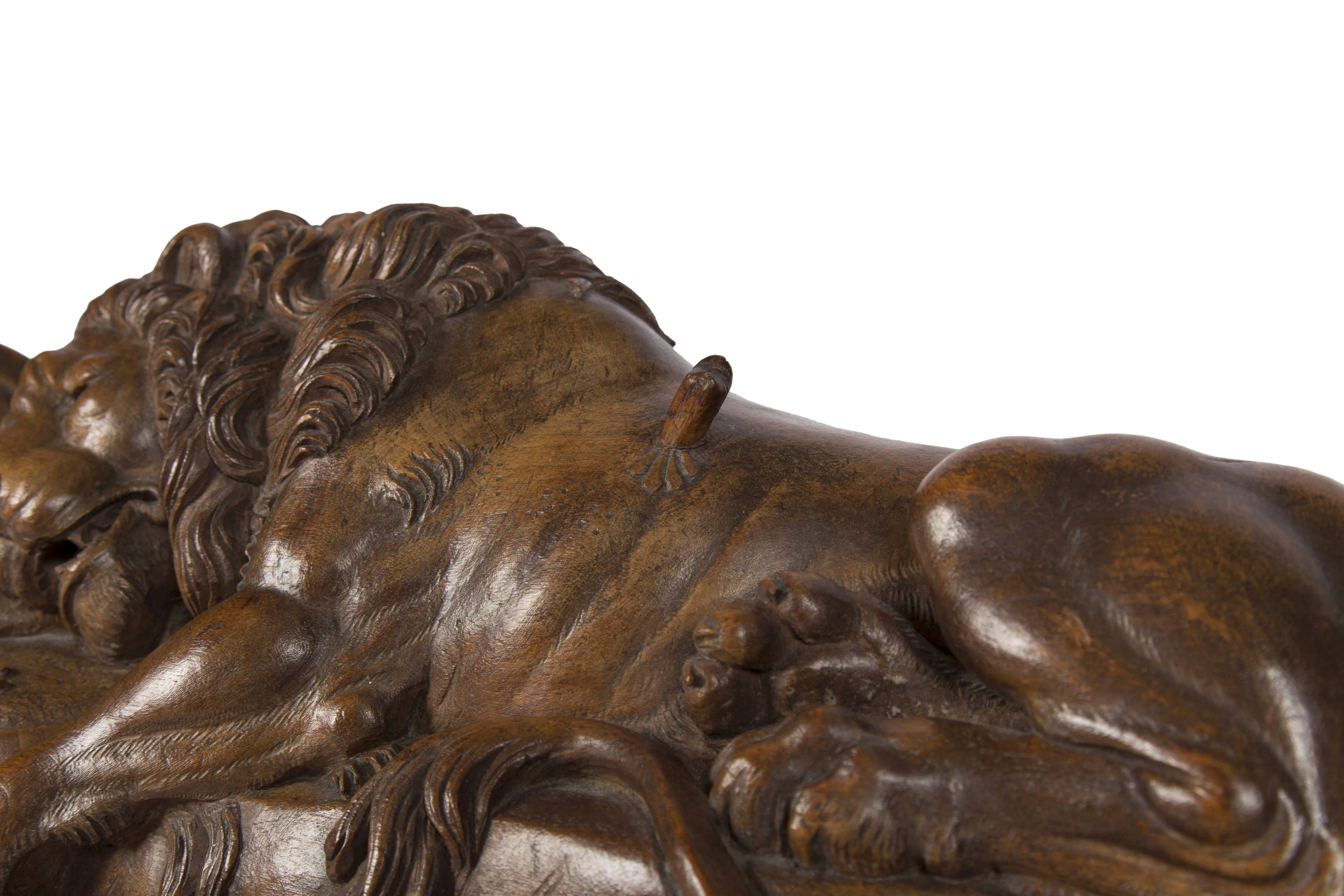 lion of lucerne wood carving