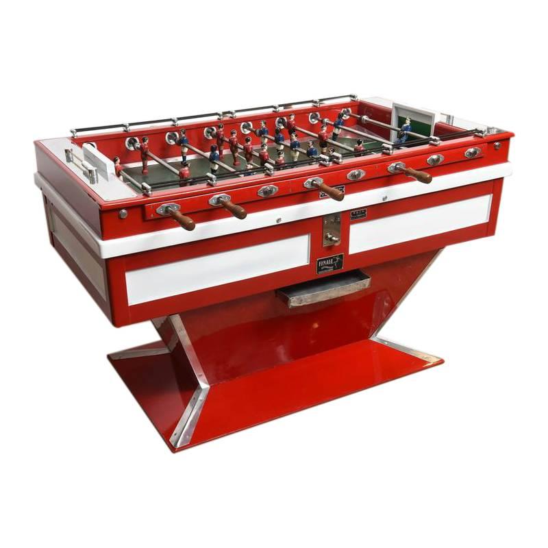 Originally made in the small town of Besançon, France during the mid-20th century, this exquisite foosball table is a true collector's piece for any foosball or football (soccer) enthusiast.

All of the foosmen are cast iron and hand painted. The