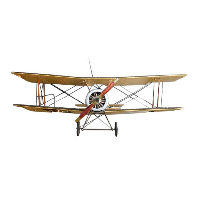 This stunning World War I era Sopwith biplane model was hand-built from scratch by an airplane enthusiast in the 1950s. It features hand painted details.

It is a large model with intricate details and looks great hung from a ceiling.
