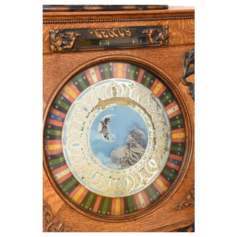 Arguably the rarest single upright slot machine in existence, this completely original 1907 Caille Venus Upright Slot Machine with Music is sure to be the apple of any true collector's eye. 

Constructed in Detroit, Michigan circa 1907 by the