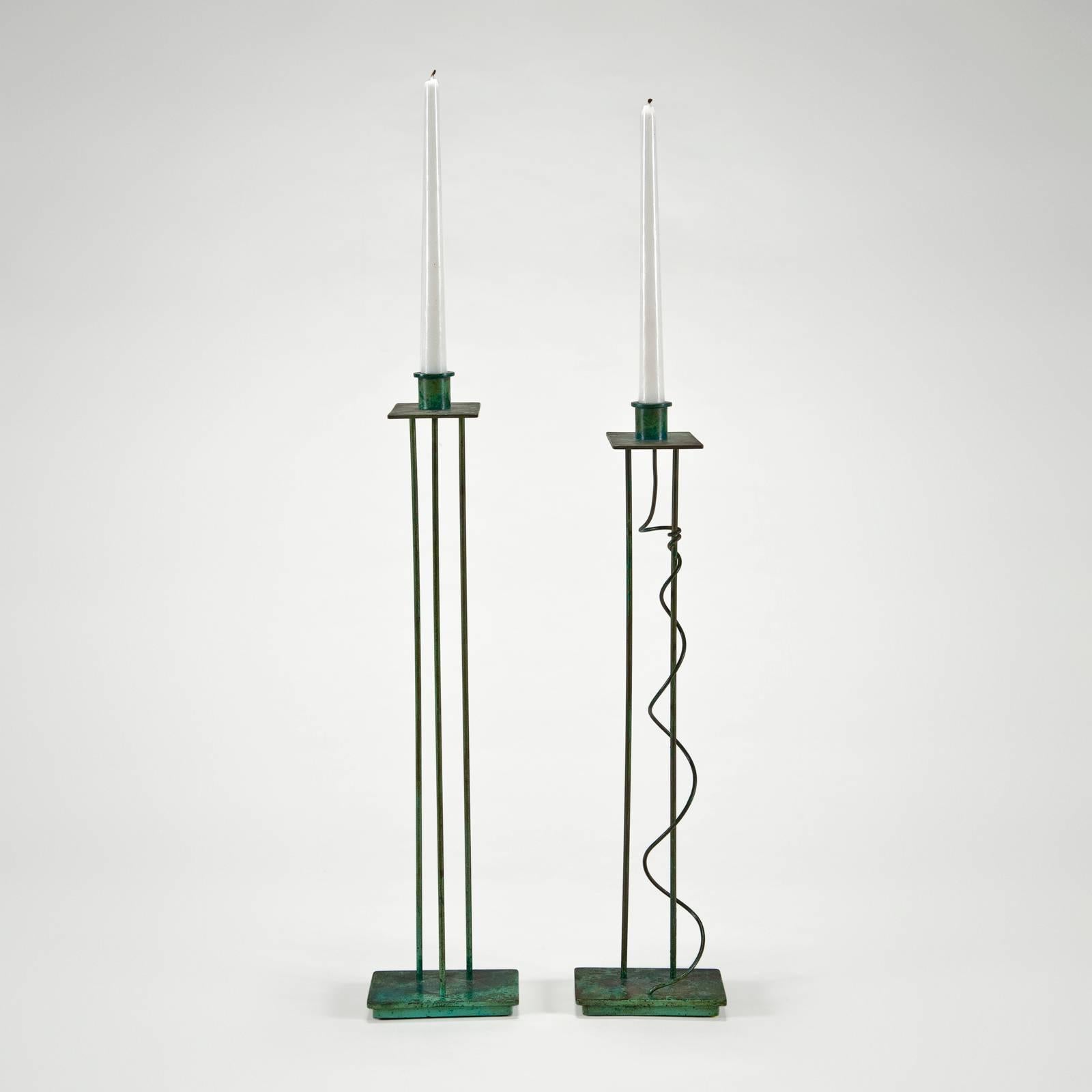 These early prototypes were used as samples for the patination of the bronze. This coloration is more closely related to traditional antique techniques, and is quite rustic. The final patina selected for production was a paler green with a more