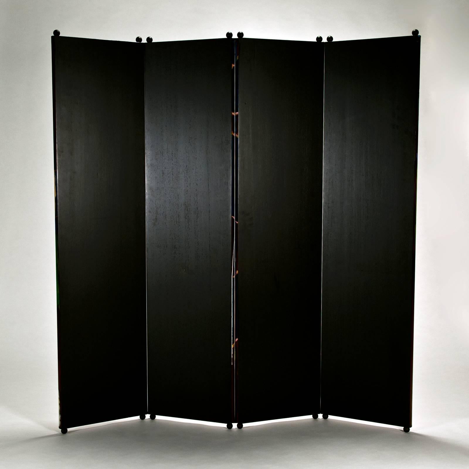 The screen is ingeniously hinged using threaded pins and metal balls, which facilitate easy assembly and leveling. The screen is signed castle 1993 at the bottom in the center of the fourth panel. The back of the screen is stained black. In very