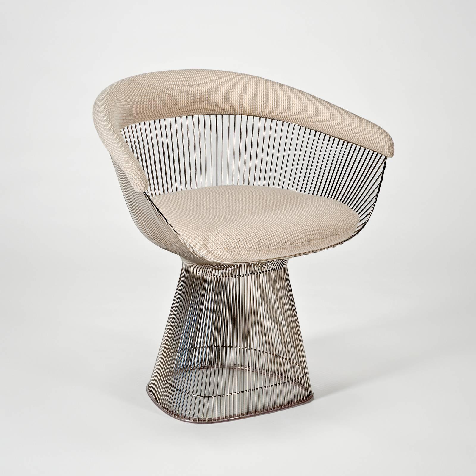 Originally designed in 1966 by Warren Platner as the centerpiece of a now-famous collection including tables, chairs and an ottoman and  and manufactured circa 2010. The process of welding steel rods to circular frames creates a moire pattern in the