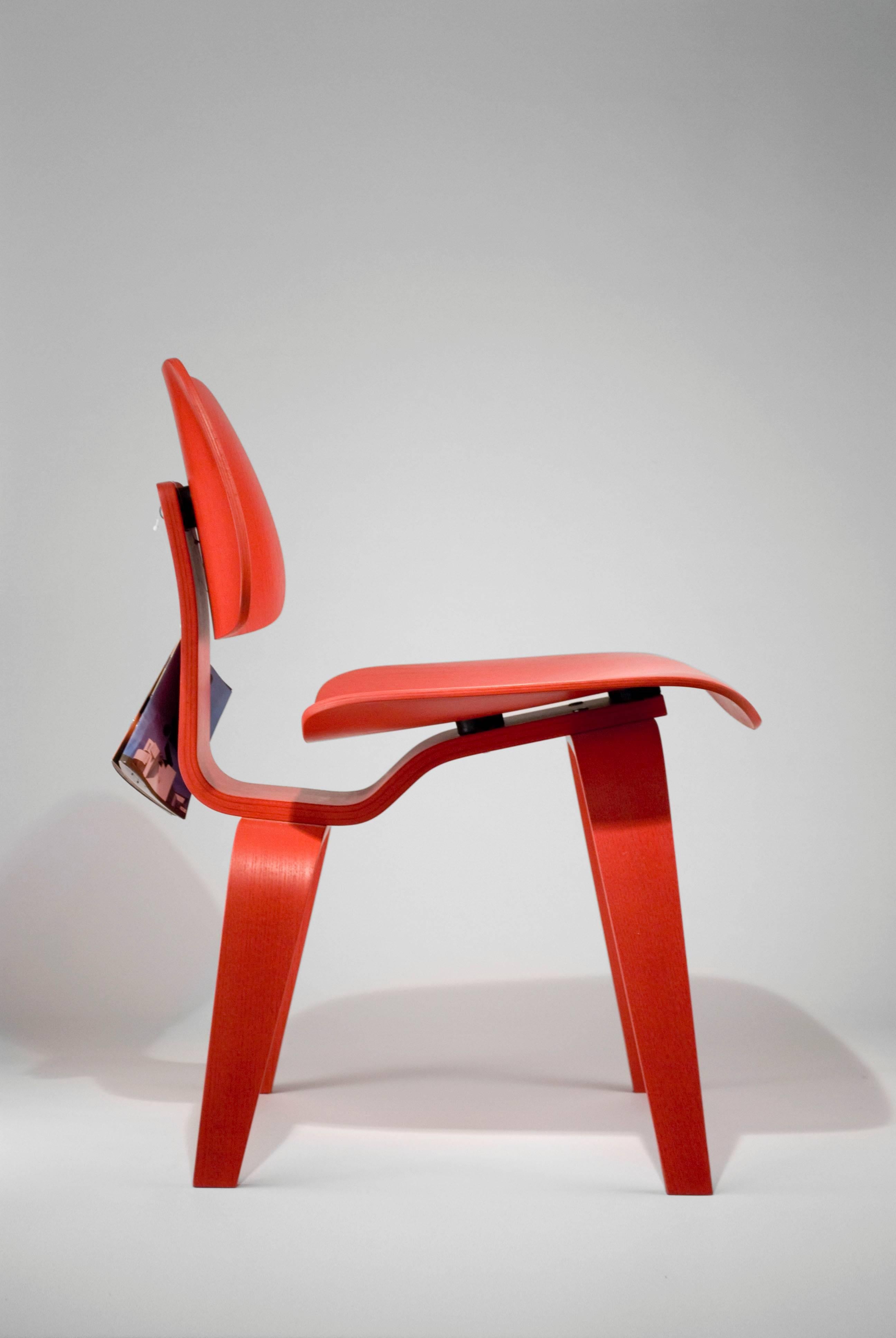 An icon of American design, one of the most recognized chair designs in the world today. Authentic and brand new with original hang tag. Produced in 2002. Vitra still produces this chair for distribution in Europe although this color in the DCW is