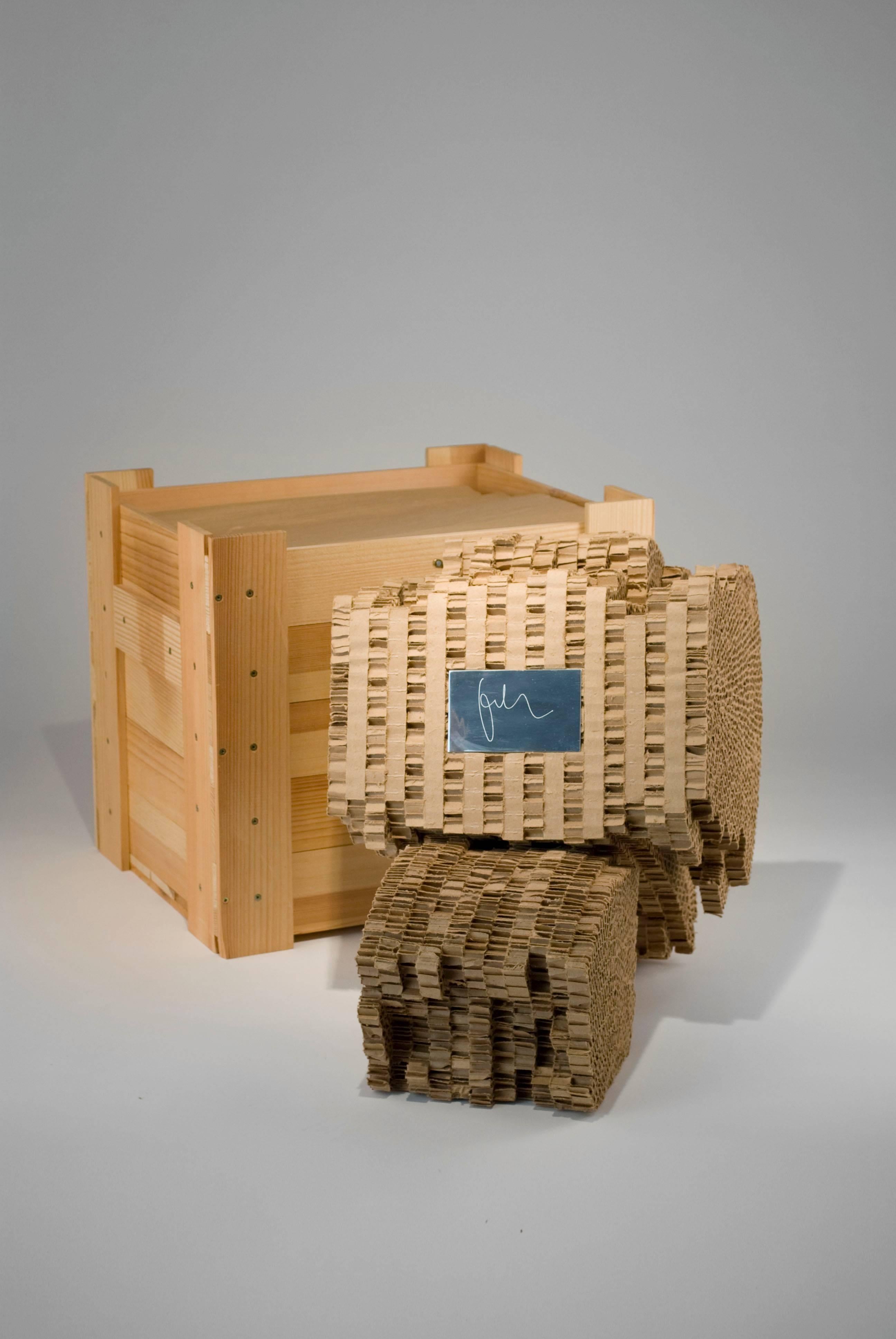 The story goes that one day, architect Frank Gehry noticed a pile of cardboard outside his office, a material he preferred for his architectural models, and he began to glue laminated pieces together and then carve them with a hand saw and pocket