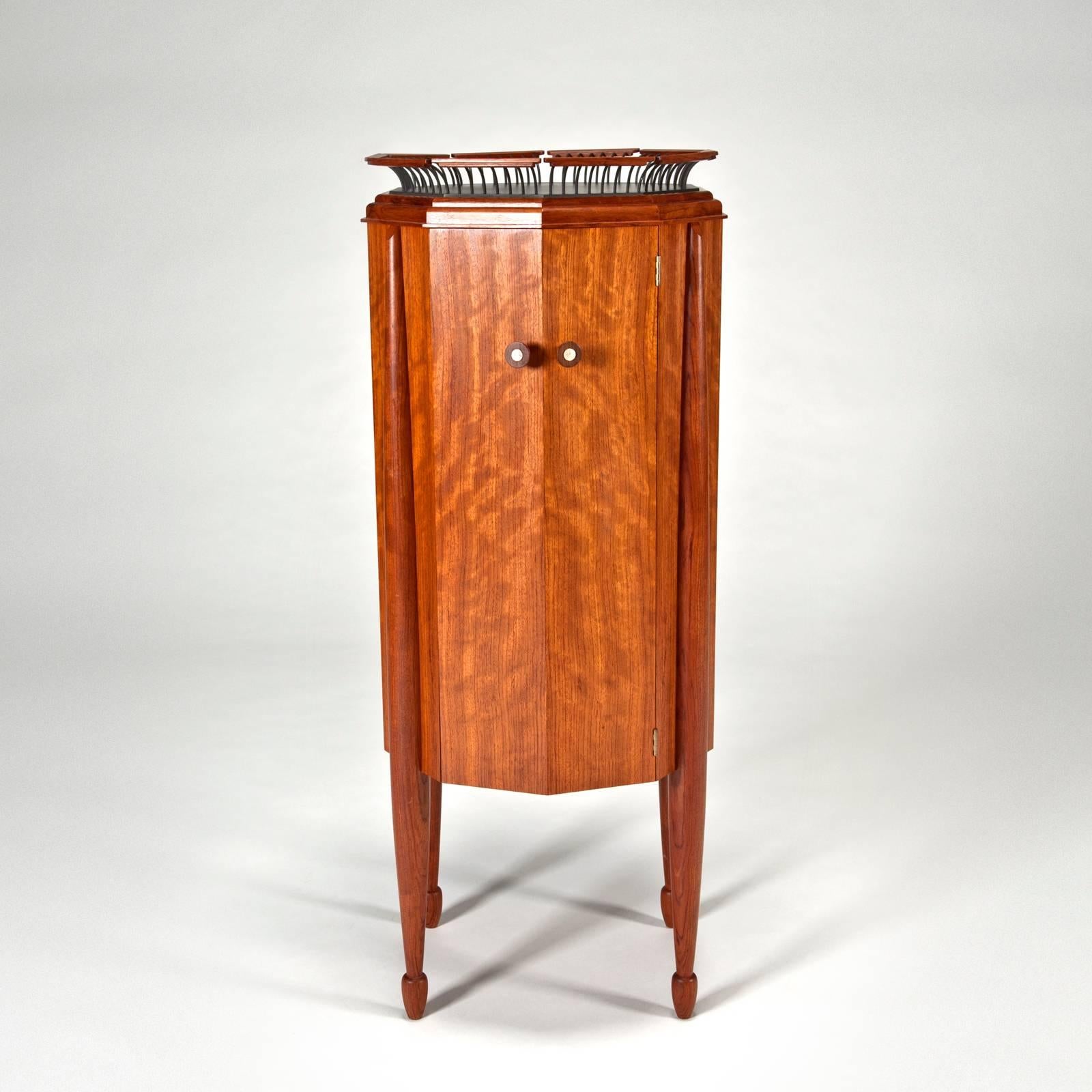 John Dunnigan proudly proclaims himself a furniture maker, with a deep understanding of the history of furniture makers before him. His works often evoke memories of Art Deco and Biedermeier styles, yet are distinctly contemporary while still