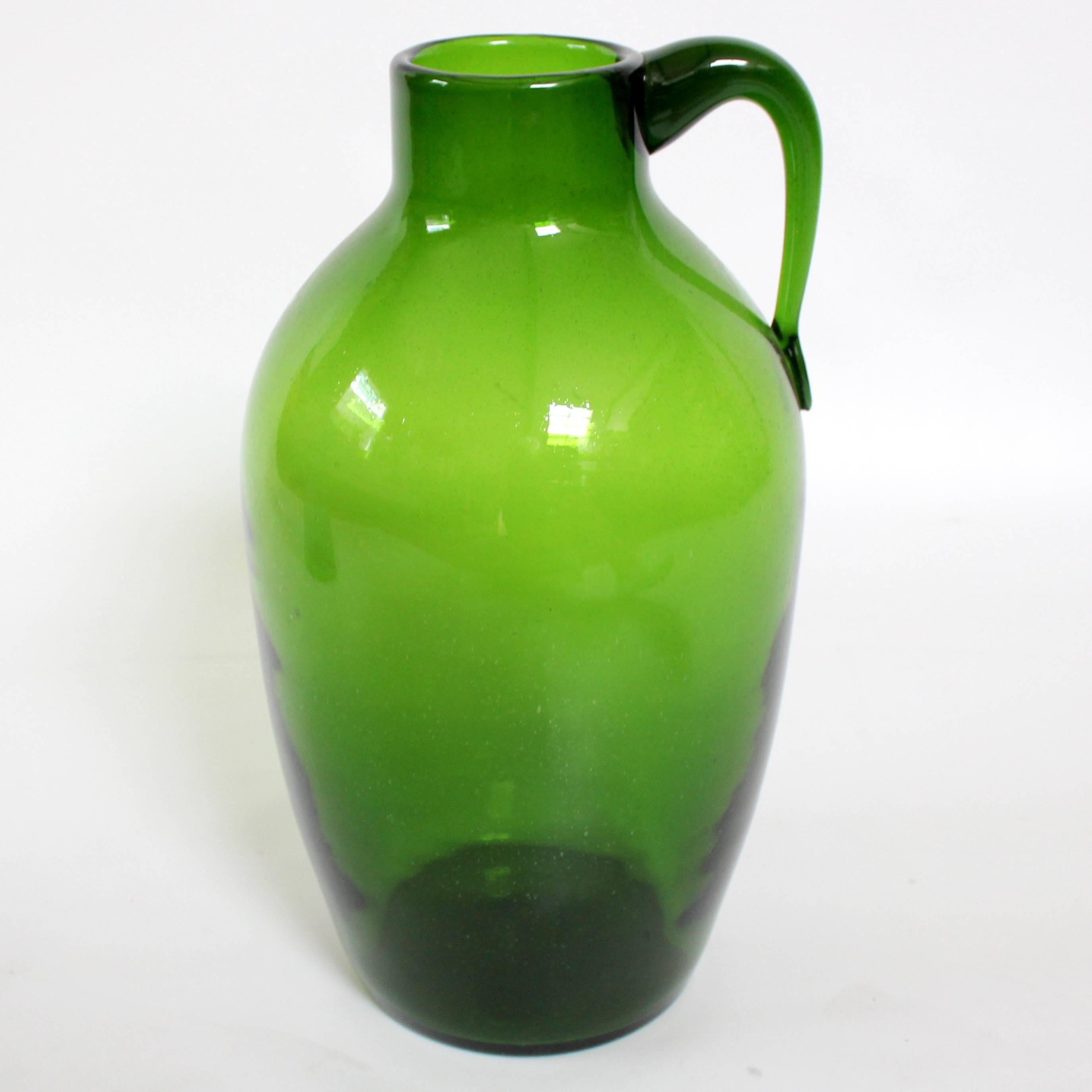 Large Mid-Century green blown glass jug by Blenko.