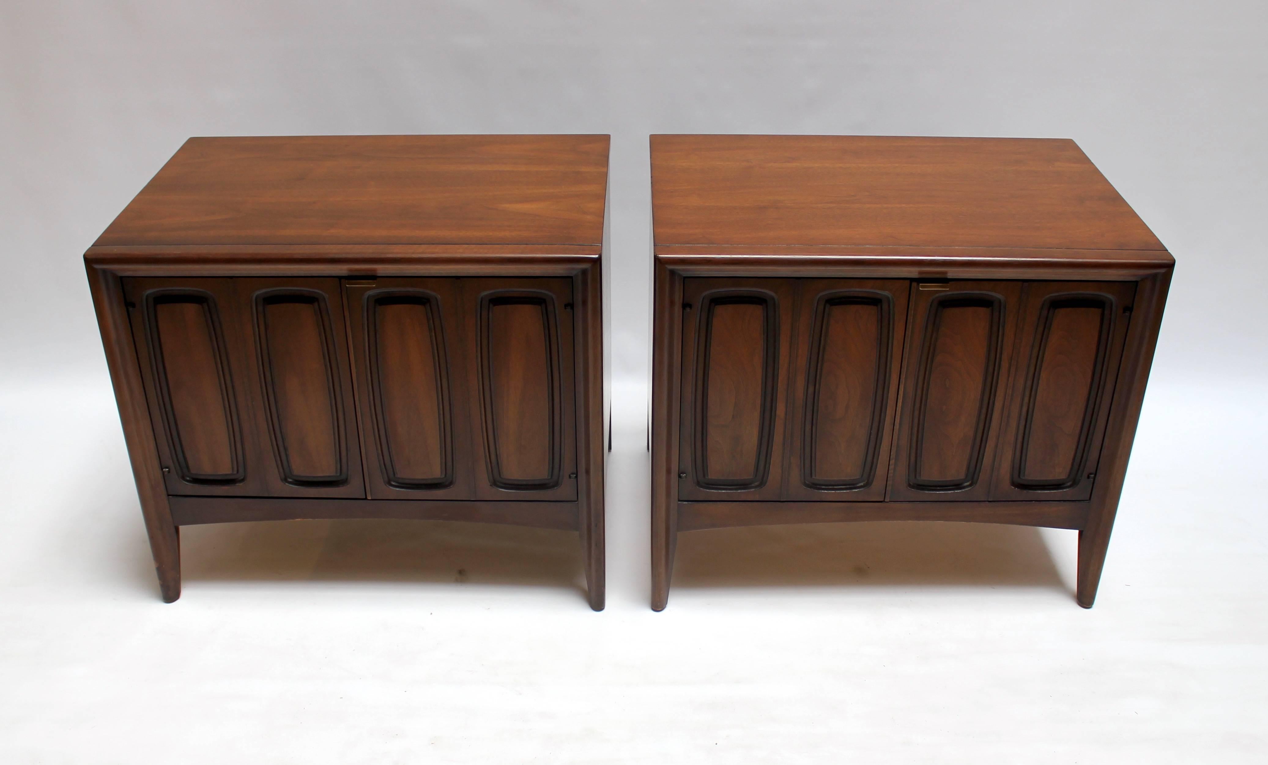 Pair of 1960s Broyhill Emphasis walnut nightstands. Price is for the pair.