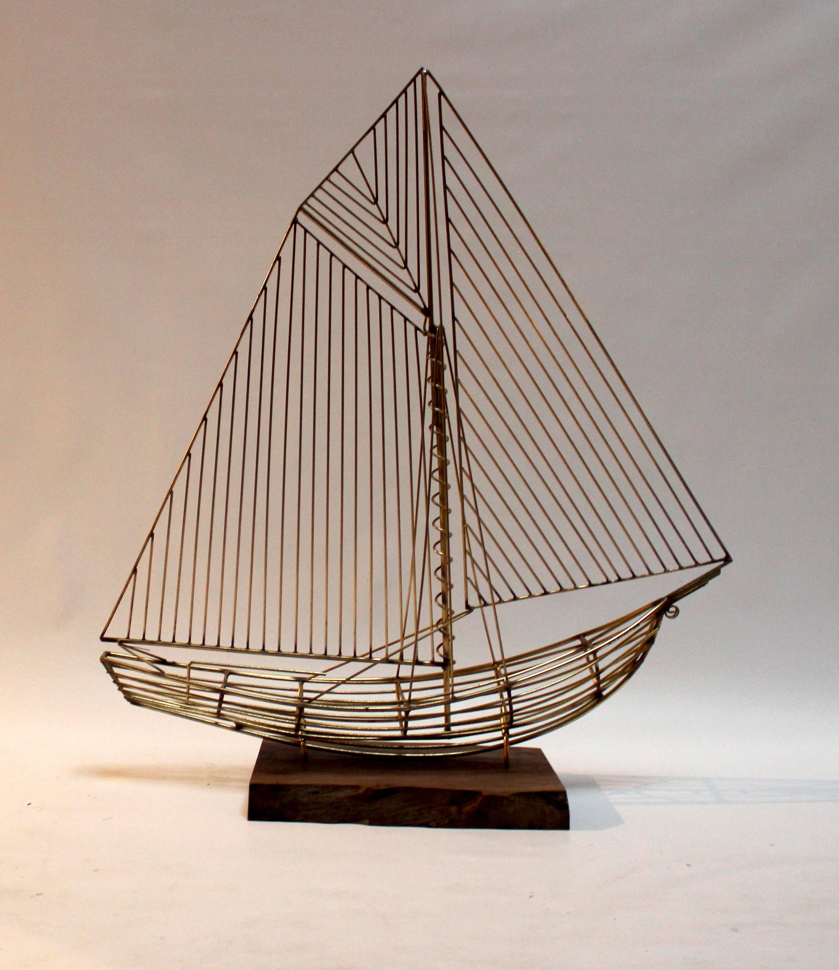 Wire sailboat sculpture by C. Jeré with walnut Stand. Signed 