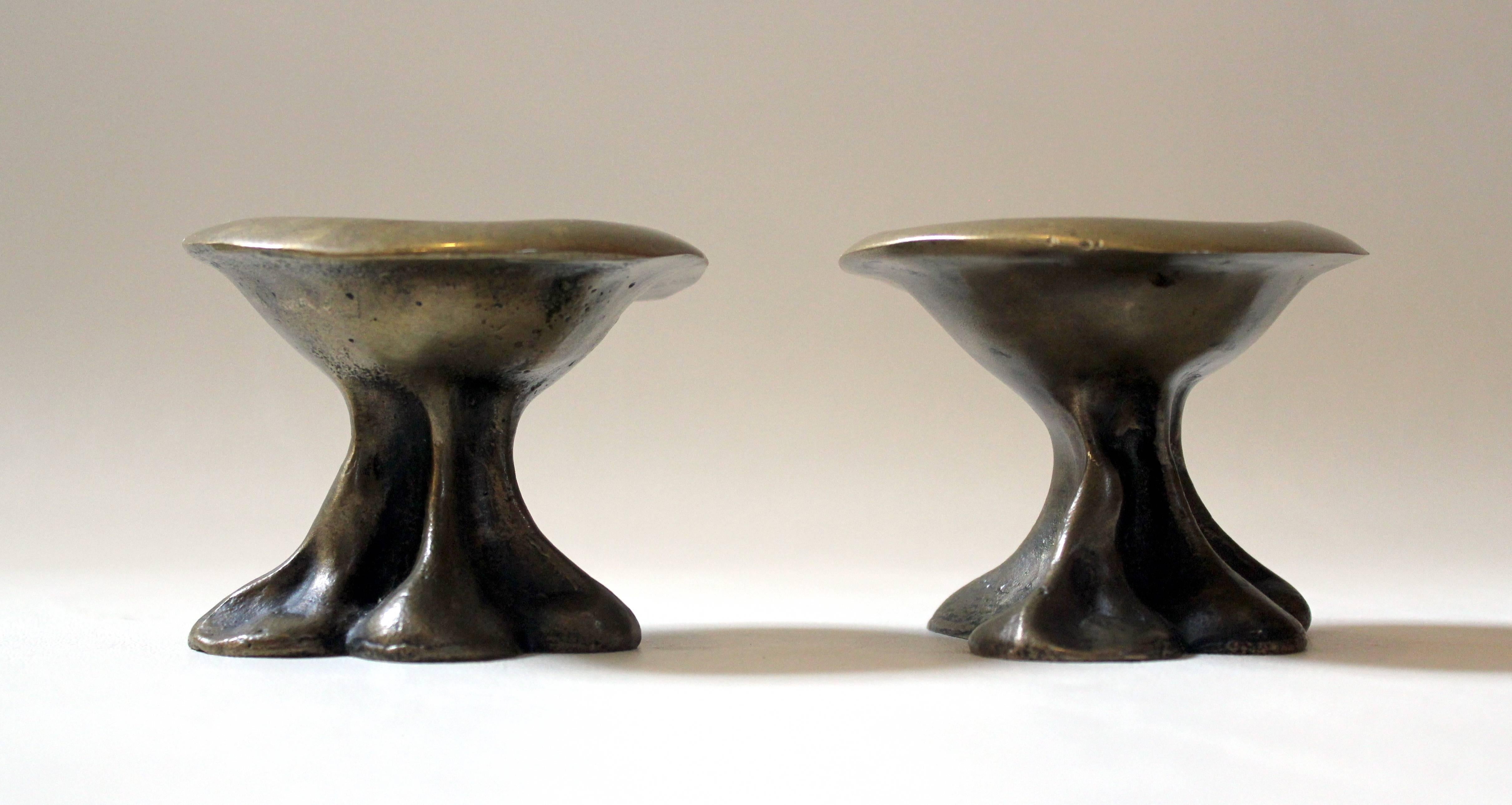 Pair of brass Brutalist-style decorative mushrooms. Can be used as decorative items or small receptacles or votive candle holders.